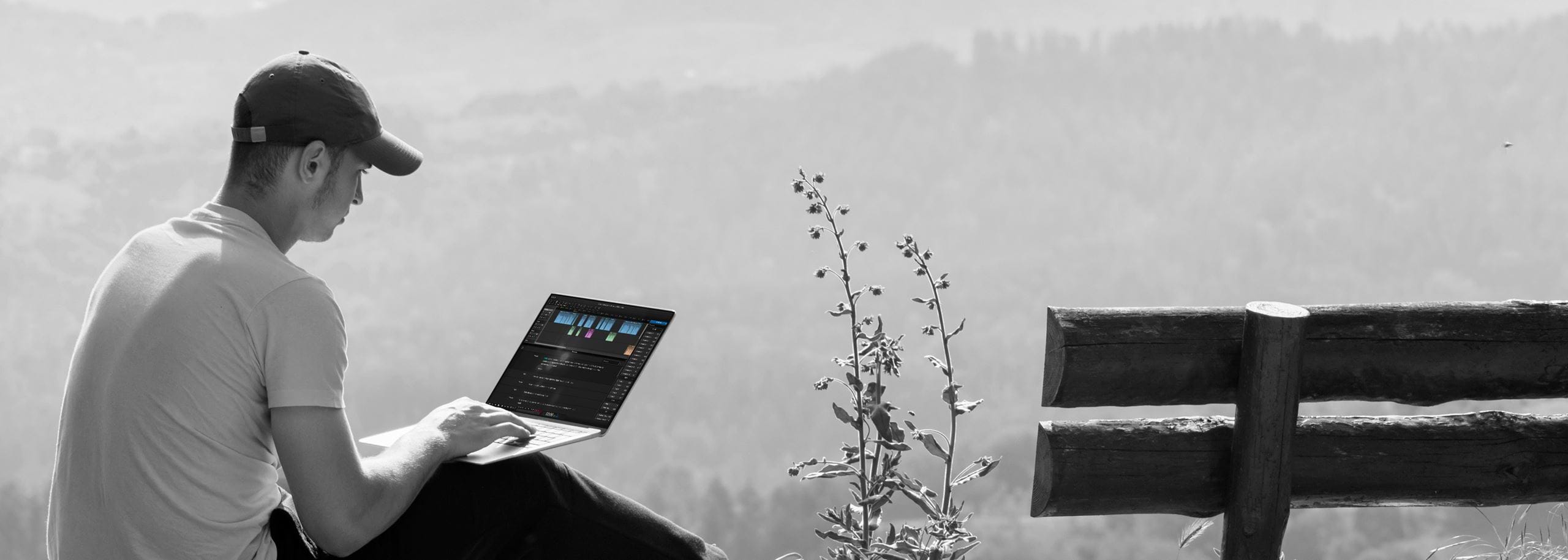 A journalist editing audio offline in Hindenburg Pro while working outdoors in the mountains. Hindenburg enables professional audio storytelling anywhere in the field, even without internet access.