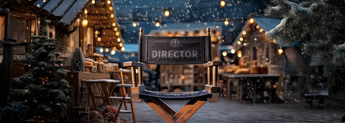 Hindenburg Systems Directors Chair at Cozy Christmas Market where Snow is  Falling